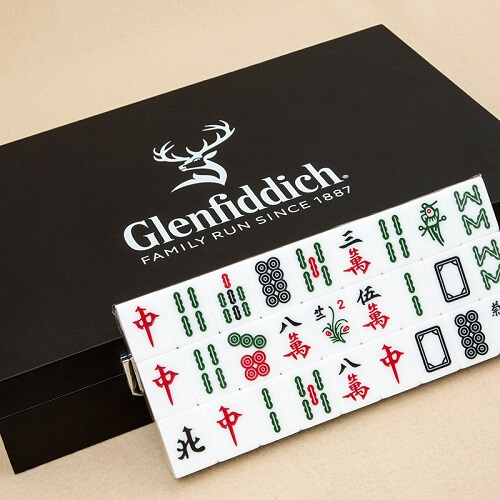 Custom mahjong set with company logo on the tile backs and carry case, corporate gifting Malaysia