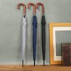 Custom 25-inch wood-handle umbrellas in grey, navy and black