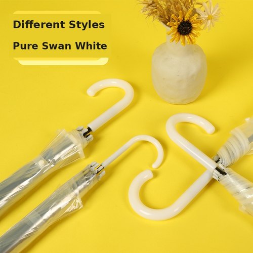 Swan white crook handle detail of the custom clear auto straight umbrella