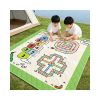 Two children playing on the custom 3-in-1 board game picnic mat at a lakeside campsite
