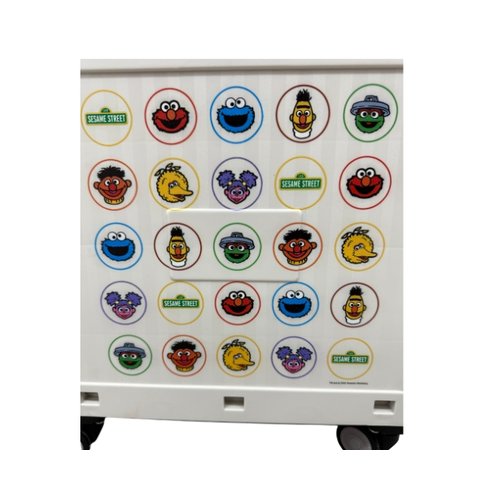 Full-colour printed character roundel pattern on the side panel of a custom foldable trolley storage box, Malaysia