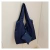 Custom Large Foldable Bag with Zipper Pouch in navy hanging open with the zipper pouch attached at the front, reusable shopping tote Malaysia