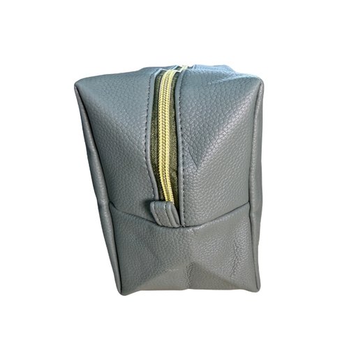 Top-down view of the full-length gold zip on a custom PU leather aircon controller pouch, Malaysia