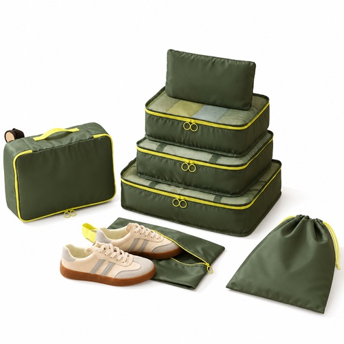 Custom 7-piece packing cube set in olive green with contrast zips, full set laid out, Malaysia