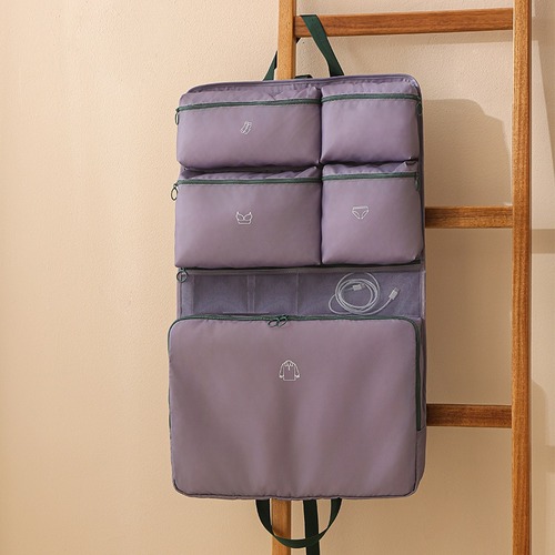 Custom hanging travel organiser in lilac with zip pockets and a cable in the document band, Malaysia
