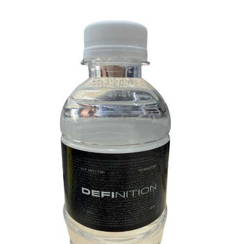Front panel of a custom water bottle label with company branding, Malaysia