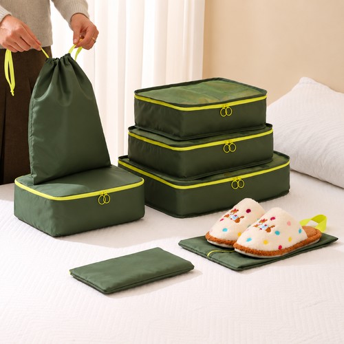 Custom packing cube set with the drawstring laundry bag being opened, Malaysia