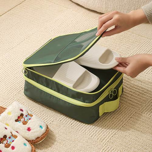 Custom travel shoe case being opened to show the separate upper and lower tiers, Malaysia