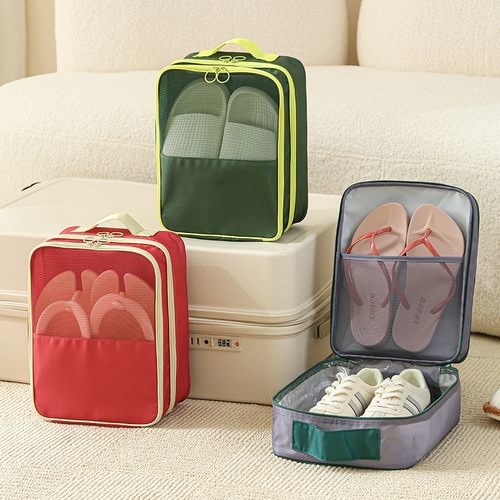 Custom travel shoe organiser in three colours beside a cabin suitcase, Malaysia
